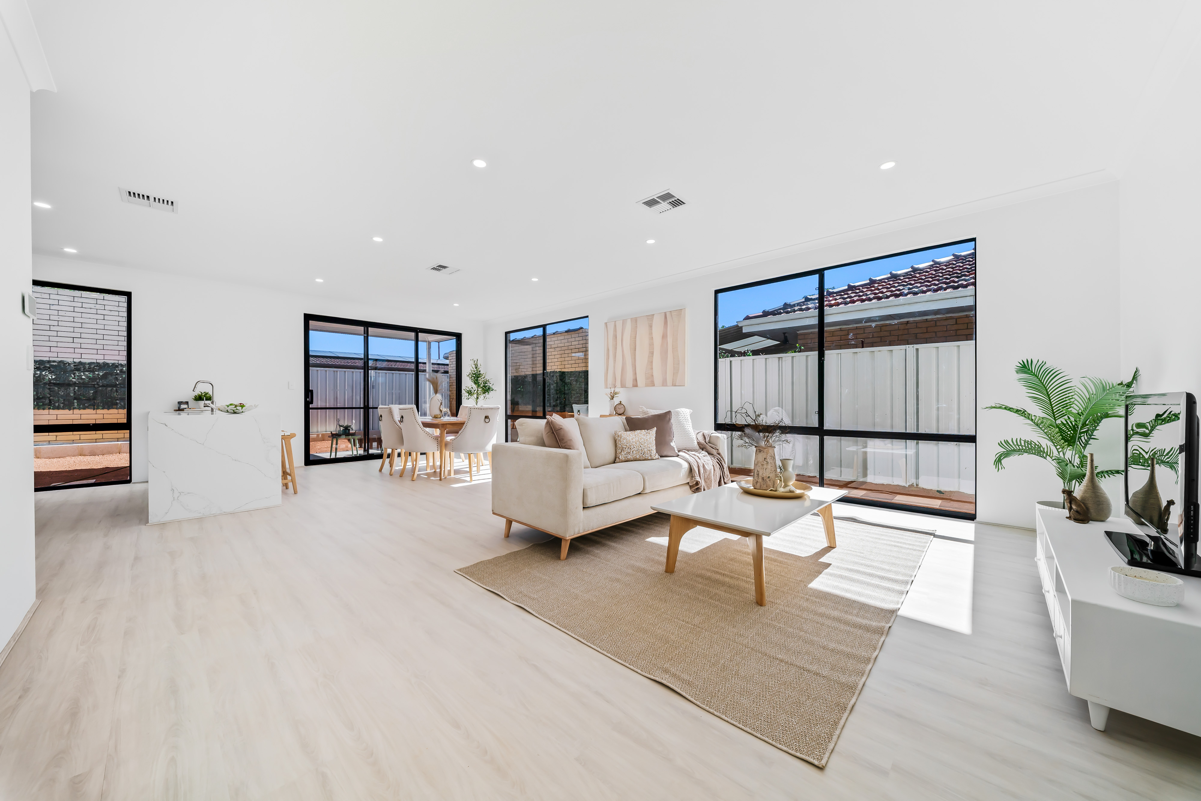 Bright open-plan living, dining and kitchen area at Brown Street, Middle Swan